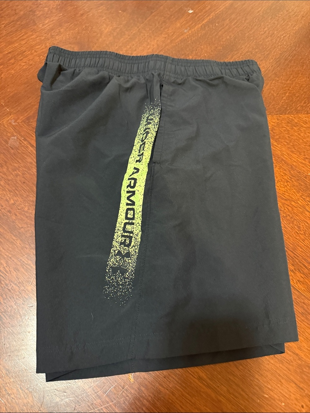 Under Armour Black Shorts with Neon Yellow Vertical Logo
